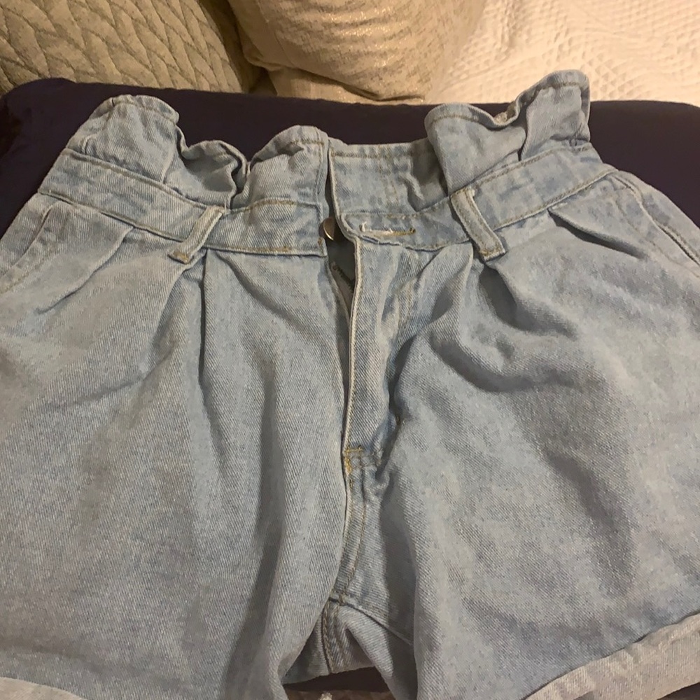 Fashion Nova jean high waisted shorts with pockets.
